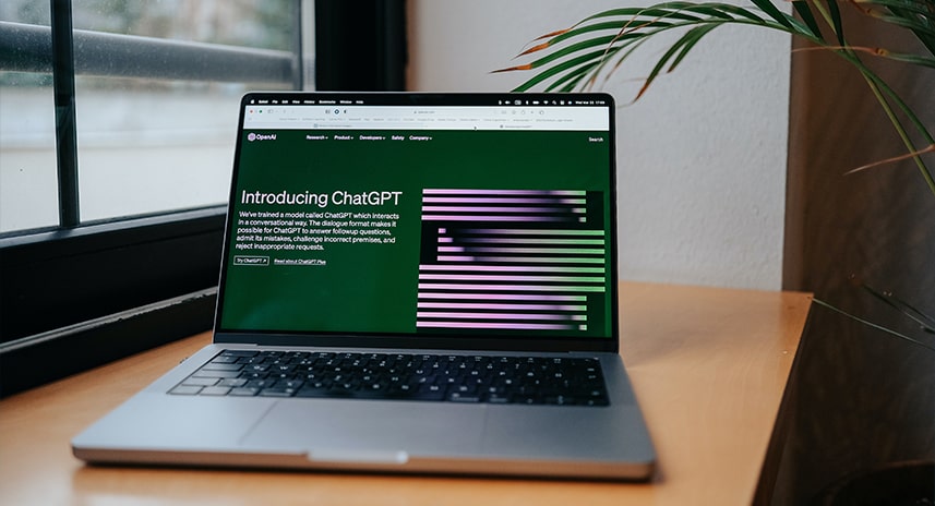 Lapton on desk with opened ChatGPT page